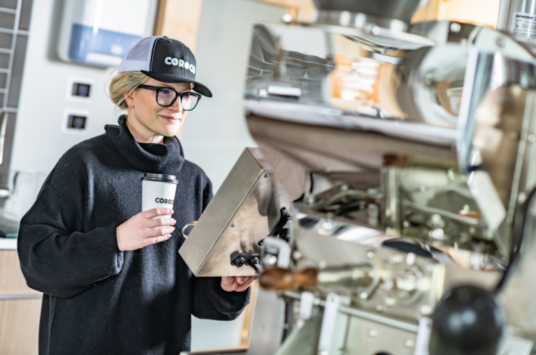 Karen roasting coffee at the COROCO Coffee roastery